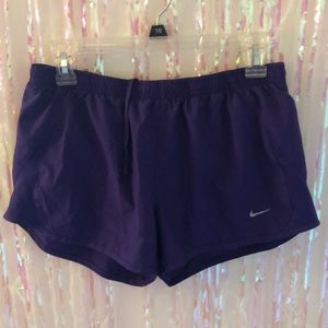 Purple Nike running shorts